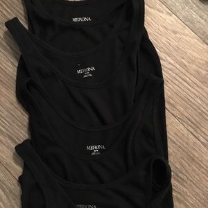 Four good quality tank tops